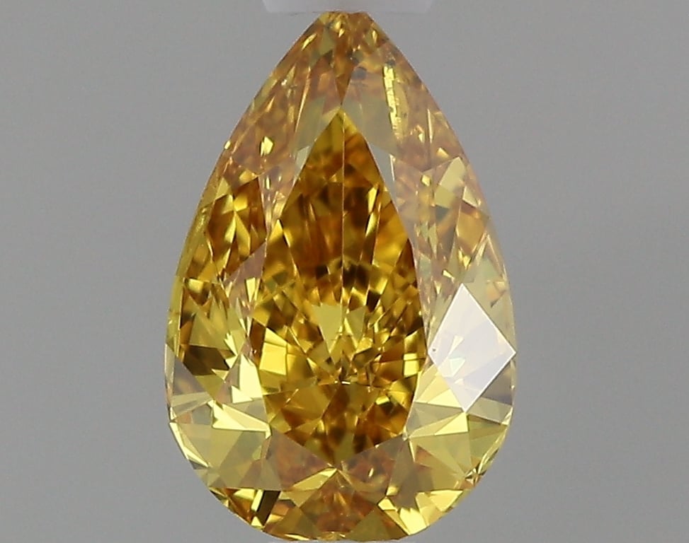 0.51 Ct. Fancy Vivid Orange Yellow Pear Diamond