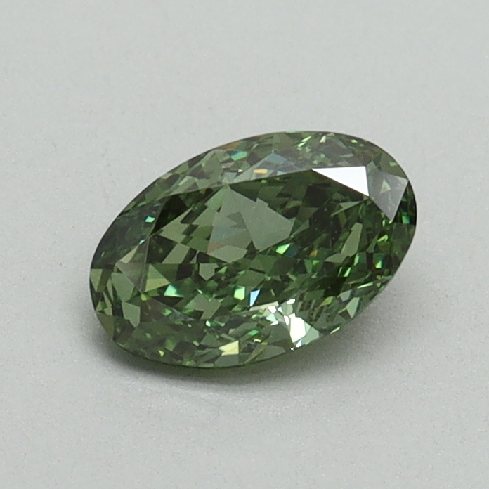 0.52 Ct. Fancy Vivid Pacific Green Oval Lab Grown Diamond